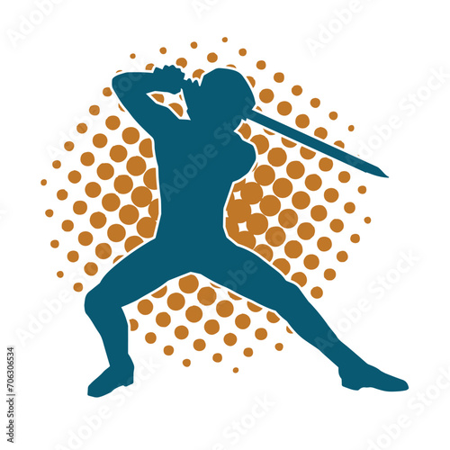 Silhouette of a male warrior in action pose with sword weapon. Silhouette of a man fighter carrying sword weapon.