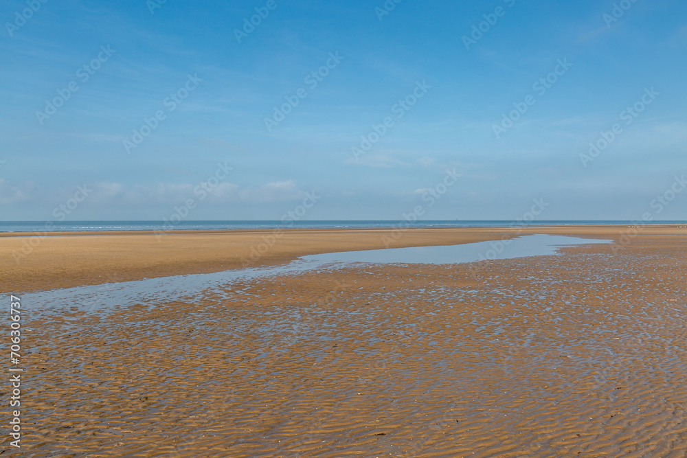 Looking out over the vast sandy beach at Formby on the Merseyside coast, at low tide