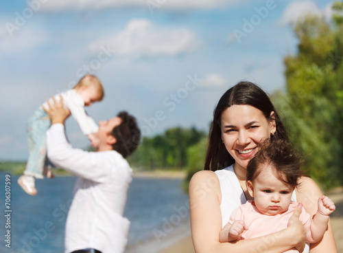Happy young family with two children © Dasha Petrenko