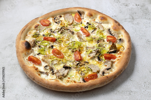 Delicious pizza isolated.Pizza with cherry tomatoes,mashrooms,sousage.