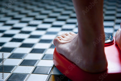 Close up of Feet on Weighing Scale
 photo