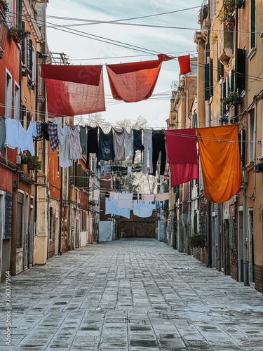 Colorful residential area with clothesline between houses in Venice 