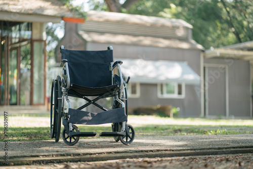 Elderly care concept. wheelchair outdoor. photo