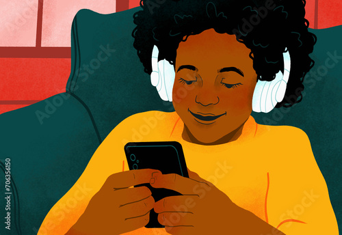 Smiling girl with headphones and smart phone playing video game
 photo