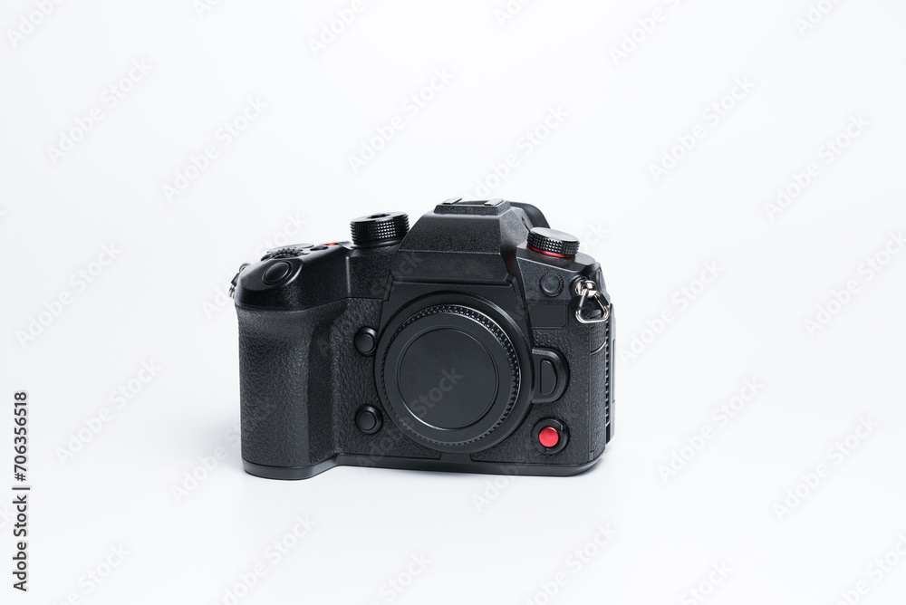 A photo camera on a white background.