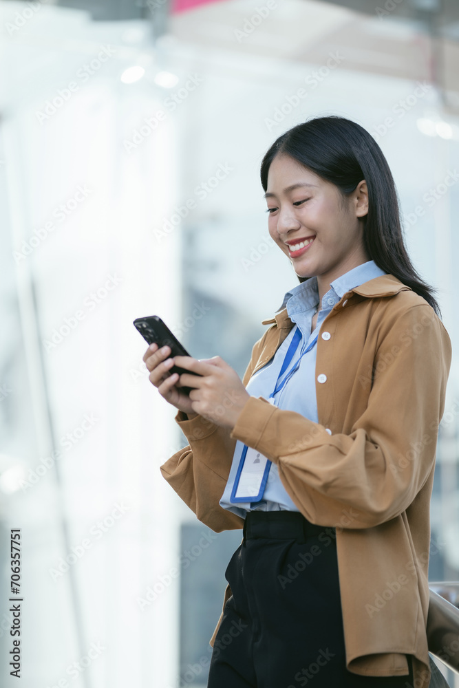 Businesswoman walking and talking phones on street in city Outside Office. Businesswoman walking and talking phones on street in city Outside Office.