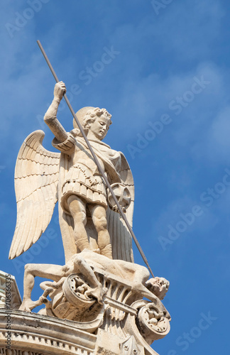 Statue of St Michael killing the Satan , on the top of St Jacobs cathedral in Sibenik, Croatia