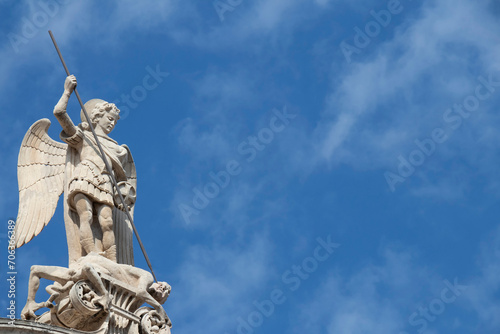 Statue of St Michael killing the Satan , on the top of St Jacobs cathedral in Sibenik, Croatia