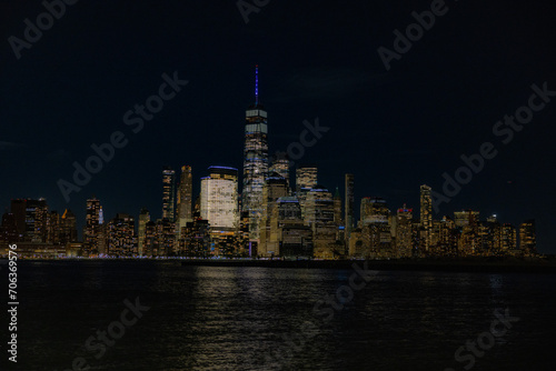 Stunning view of the New York City skyline at night  beautifully illuminated by lights