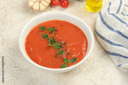 a bowl of tomato soup,vegan dish on white background