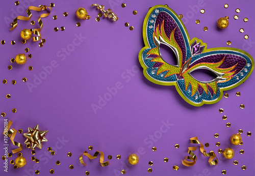 Mardi Gras Carnival Masks, Chocolate Candies in Gold foil on Purple Background.