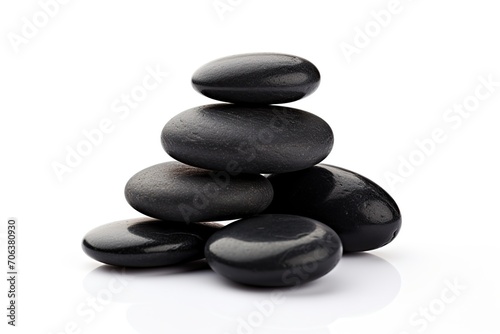 Black spa stones isolated on white background