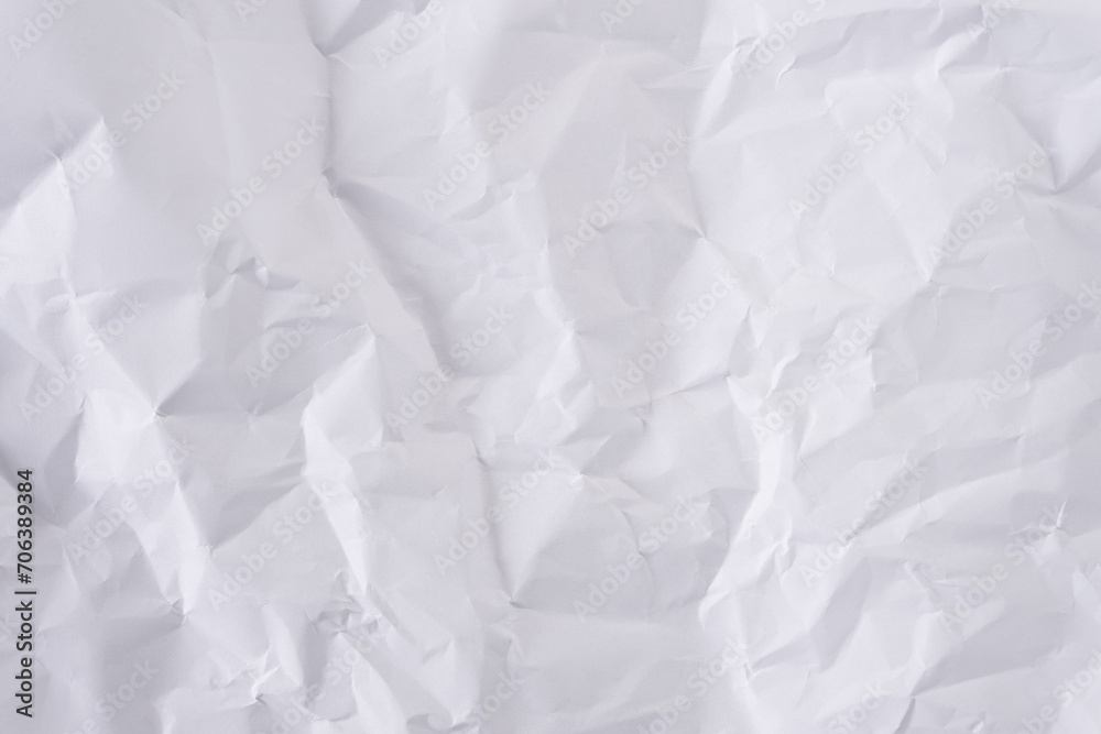 White crumpled paper texture background, clean white wrinkled paper, top view. White crumpled paper texture background, clean white wrinkled paper, top view.