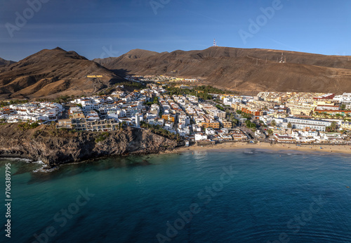 The drone aerial view of Morro Jable and Playa del Matorral in Fuerteventura Island, Spain. Morro Jable is the most populated town in the municipality of Pájara in the south of Fuerteventura.