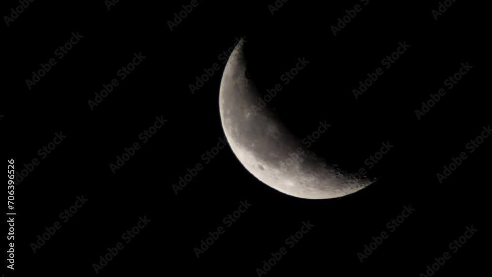 crescent phase of the moon, Lunar surface with craters, Hyderabad, India crescent phase of the moon, Lunar surface with craters, Hyderabad, India