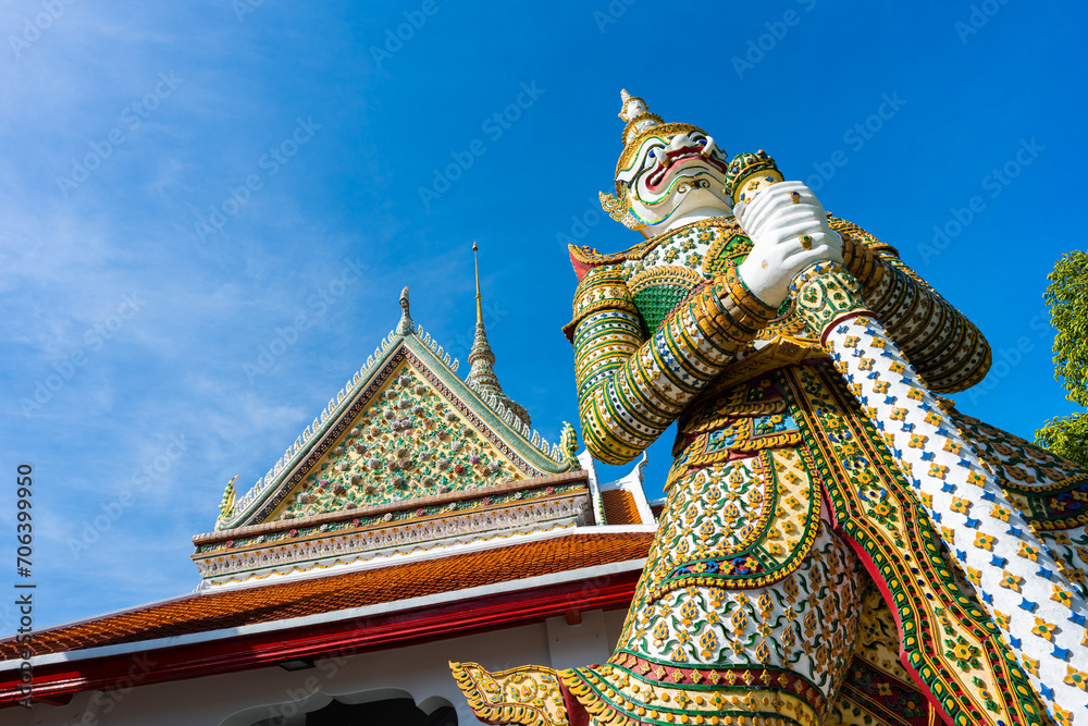 Gates to Ordination Hall with statues of Giants, demon guardians at Wat Arun Gates to Ordination Hall with statues of Giants, demon guardians at Wat Arun