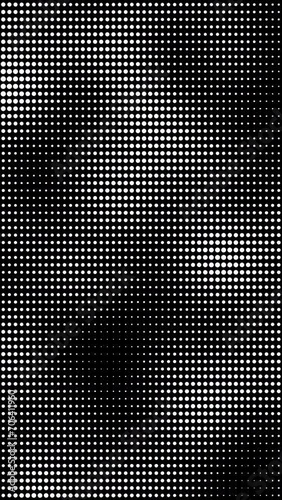 Abstract black and white gradient halftone dotted background with a pop cartoon comic vertical motion pattern. Seamless loop in retro monochrome vintage style in 4k. Fit for tint, alpha, or overlay la