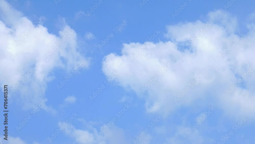 blue sky background with tiny white clouds, White fluffy clouds in the blue sky blue sky background with tiny white clouds, White fluffy clouds in the blue sky