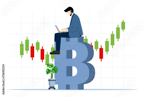 businessman investor using computer to trade crypto in large Bitcoin with candlestick price charts, Bitcoin and cryptocurrency investment, crypto trading generate profits and income from Bitcoin price