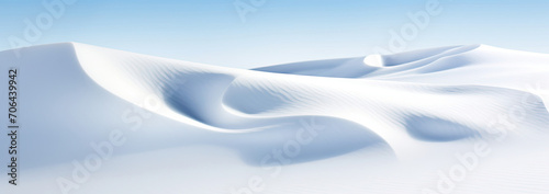 Snow Covered Hill With Blue Sky in Background