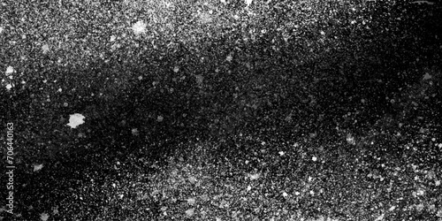 Black White water splash aquarelle painted,splash paint backdrop surface liquid color spray paint glitter art grain surface.vivid textured spit on wall.cosmic background.
