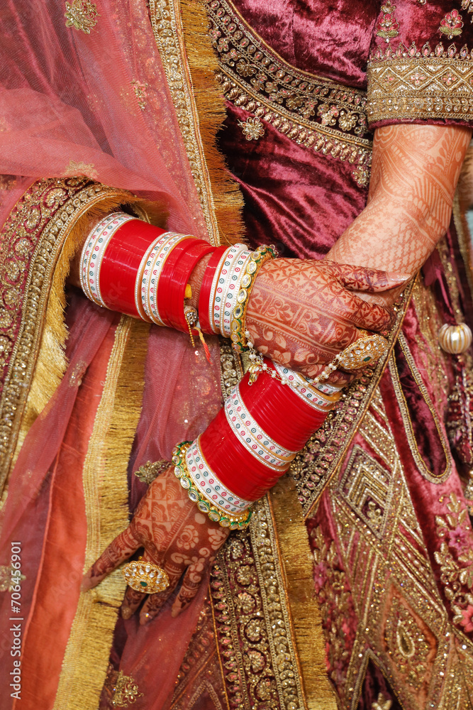 Closeup of hand of indian bride wearing beautiful bangles