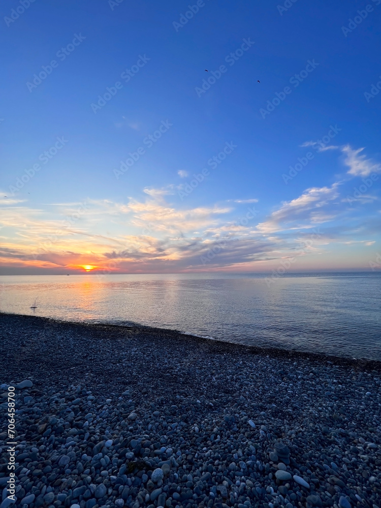 Fototapeta premium travel to Georgia - beautiful view of Black Sea at sunset in Batumi on autumn evening