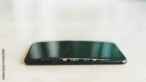 фотографія Mobile phones with screen problems caused by swollen batteries, expiry battery