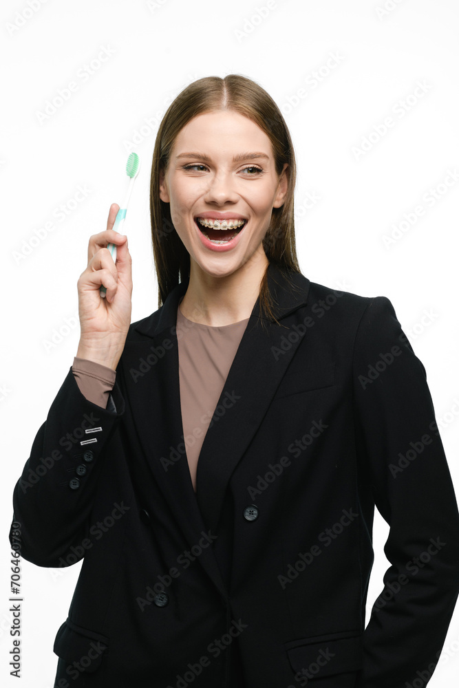 Young beautiful woman with toothbrush isolated on white background Young beautiful woman with toothbrush isolated on white background