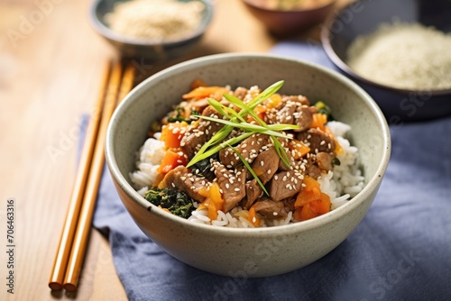 spicy beef teriyaki bowl with chili flakes and sesame