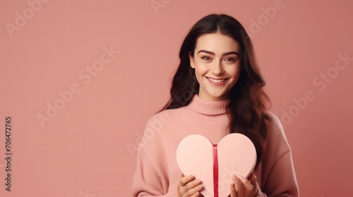 Portrait of young woman with gift box on pink background. Generative AI