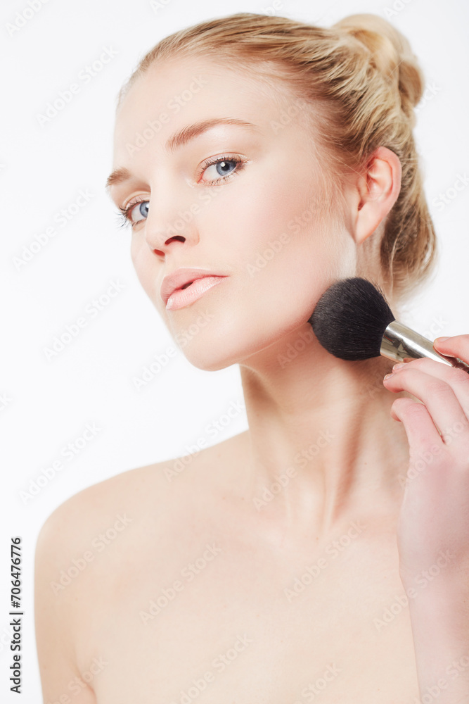 Makeup brush, portrait or model with skincare in studio for beauty or wellness on white background. Makeover, glamour or woman isolated with foundation powder, cosmetics or product for application