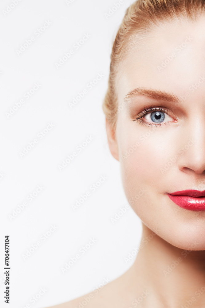 Face crop, beauty and woman with red lipstick in studio, cosmetics and skincare on white background. Lips, color with eye and dermatology for makeup glow, microblading and lashes with mockup space Face crop, beauty and woman with red lipstick in studio, cosmetics and skincare on white background. Lips, color with eye and dermatology for makeup glow, microblading and lashes with mockup space