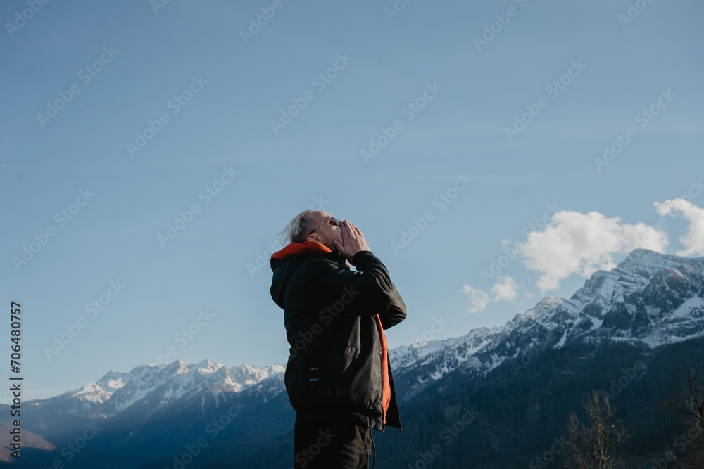 person looking at mountain
