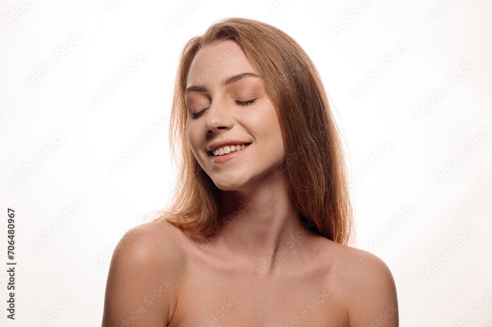 Beauty portrait of a pretty blonde girl posing on an isolated white background. Skin care concept Beauty portrait of a pretty blonde girl posing on an isolated white background. Skin care concept