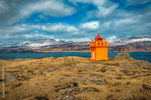 Djupivogur Lighthouse is located on the southeast coast of Iceland, on a rocky point on the west side of the port of Dj?pivogur. photo