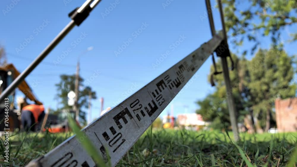 construction or repair of a road section
there are instruments for road measurements on the roadside
a measuring rail is attached to the tripod of a level
modern technologies in construction construction or repair of a road section
there are instruments for road measurements on the roadside
a measuring rail is attached to the tripod of a level
modern technologies in construction