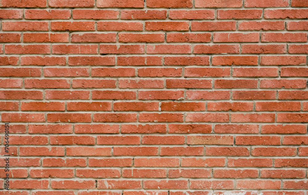 Obraz premium Red brown vintage texture brick wall with shabby structure, concept horizontal wide brick wall background. Retro house or apartment facade, abstract web banner