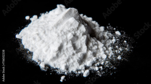 Illicit synthetic drug isolated on black background photo