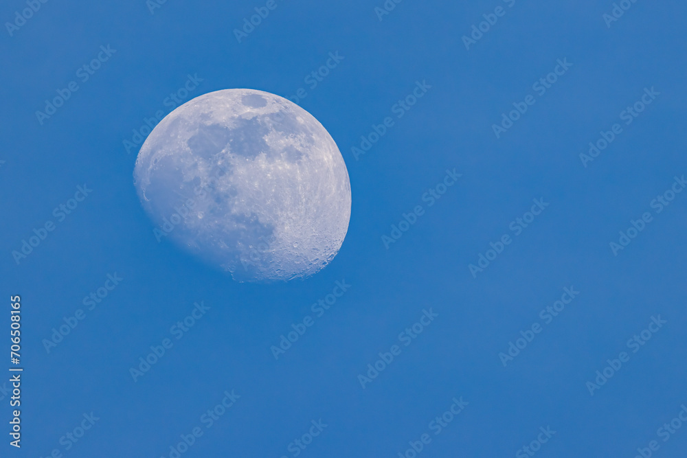 Moon in the blue sky, closeup of photo with soft focus Moon in the blue sky, closeup of photo with soft focus