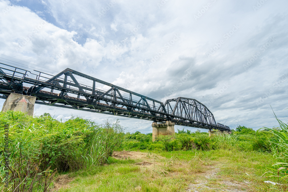 Beautiful scenic of black steel railway bridge across the river Beautiful scenic of black steel railway bridge across the river