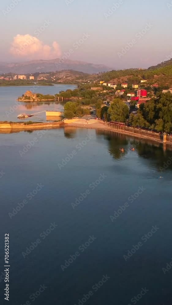 Aerial drone view of the beautiful landscape of Shiroka Lake at sunset near Shkoder. Albania Aerial drone view of the beautiful landscape of Shiroka Lake at sunset near Shkoder. Albania