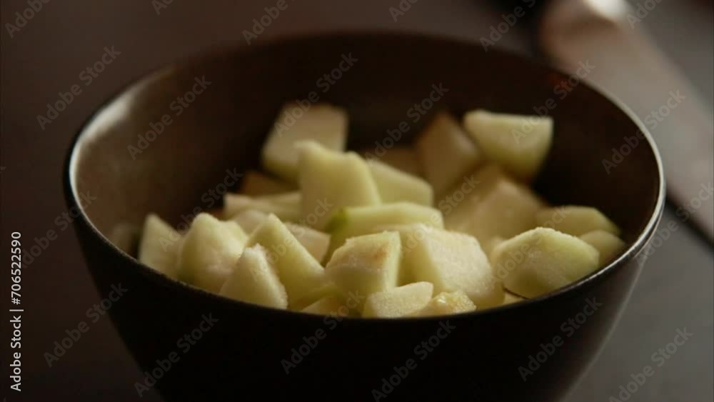green apples cubes in a bowl close up green apples cubes in a bowl close up