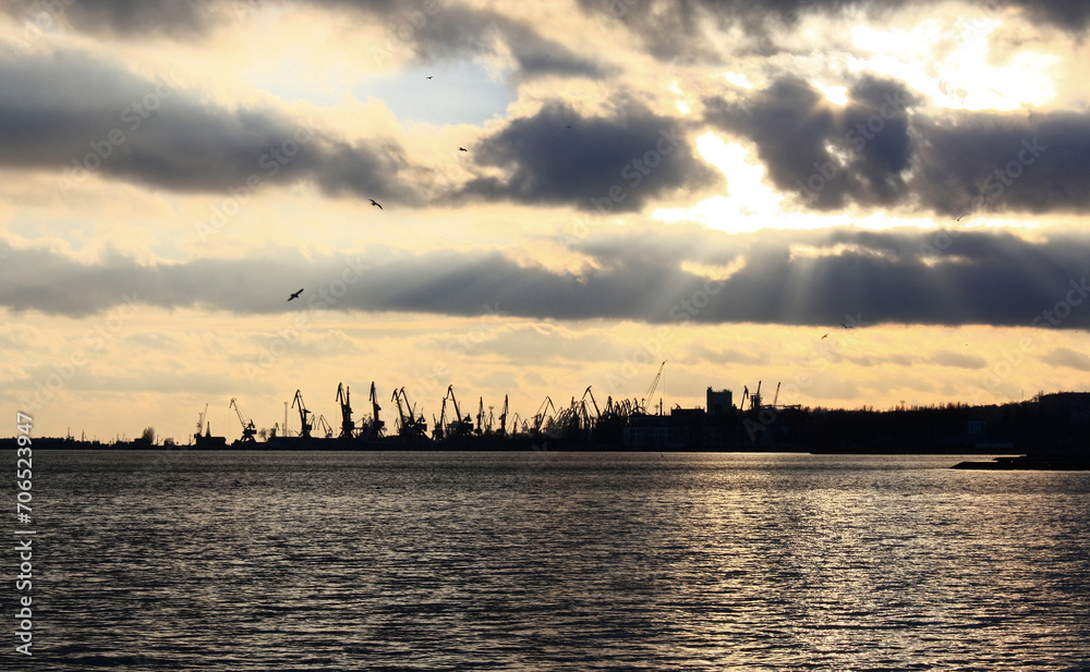 sunset over the harbor in Mariupol, Donbass