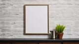 Empty wooden picture frame mockup hanging on white brick wall background