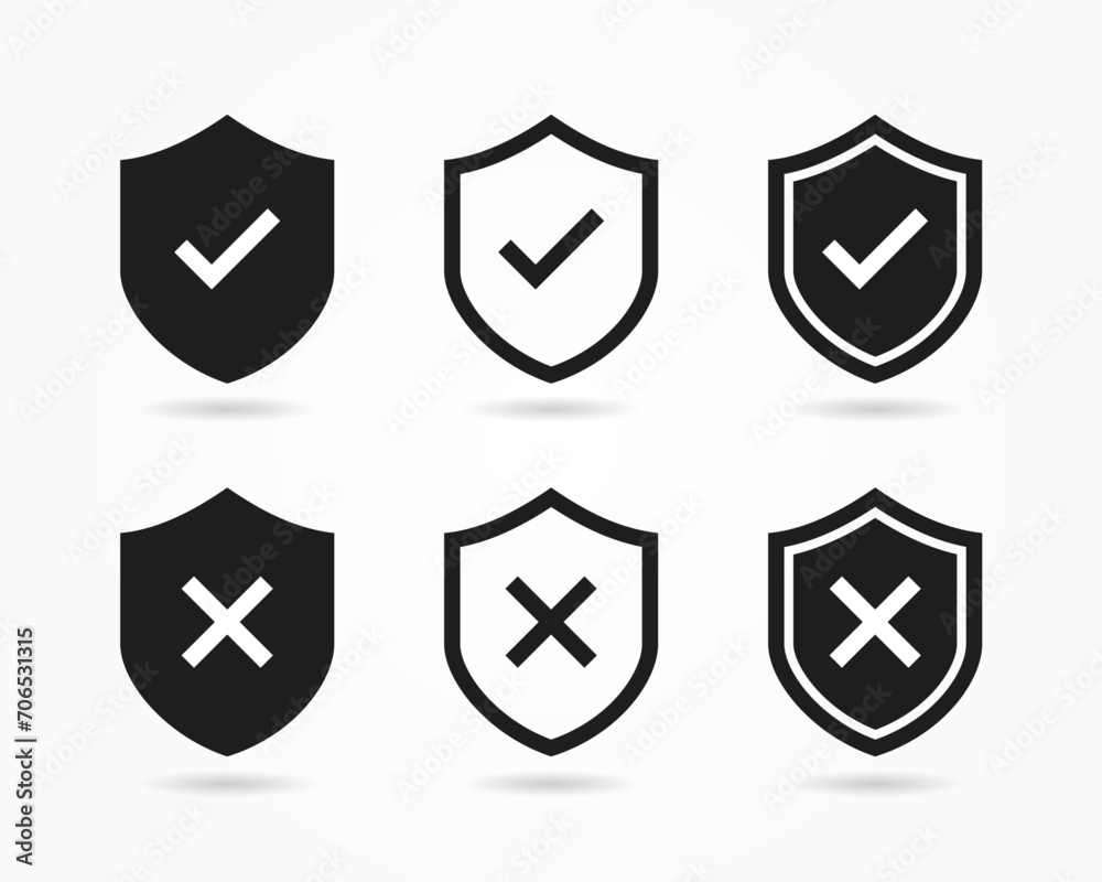 Shield with check mark and shield with cross mark icons. Tick and cross icons Shield with check mark and shield with cross mark icons. Tick and cross icons