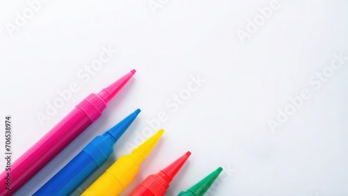 Multicolored markers from below, for business, school and office, on white isolated background, copy space