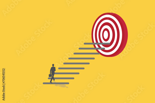 Businessman walking up stair to reach goal. concept of Reach target or reach goal, success, achievement or growth, challenge and motivation