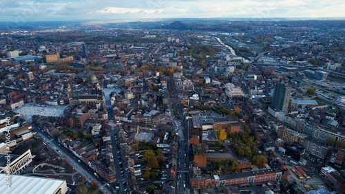 Aerial around the city Charleroi in Belgium on a cloudy afternoon in later fall.