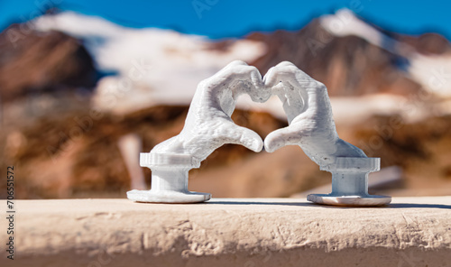 Heart hands gesture with a 3D printed sculpture - free model from thingiverse - at Wildspitzbahn cable car, Pitztal Glacier, Imst, Tyrol, Austria